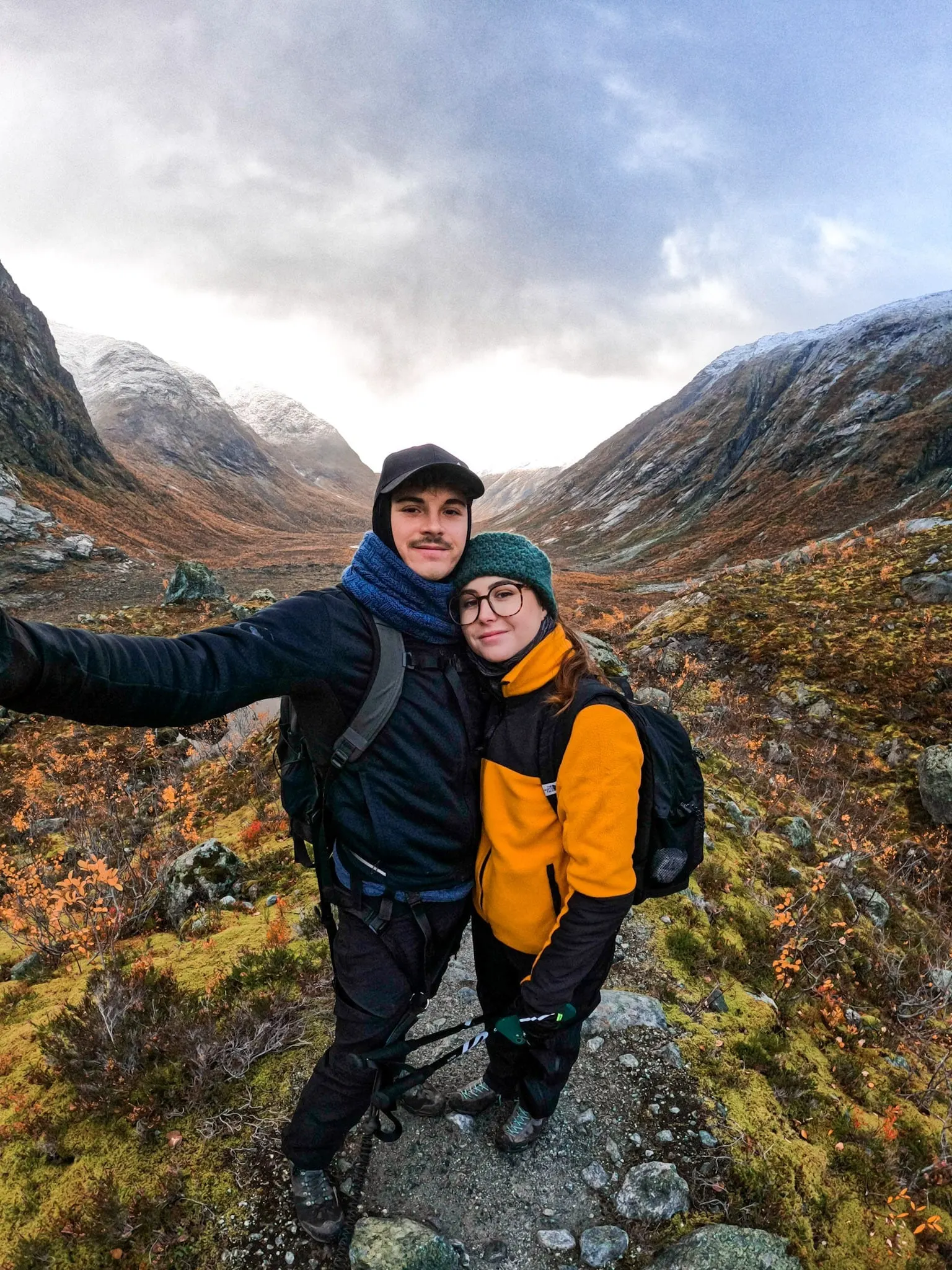 Anthony and Marion hugging in a mountain valley